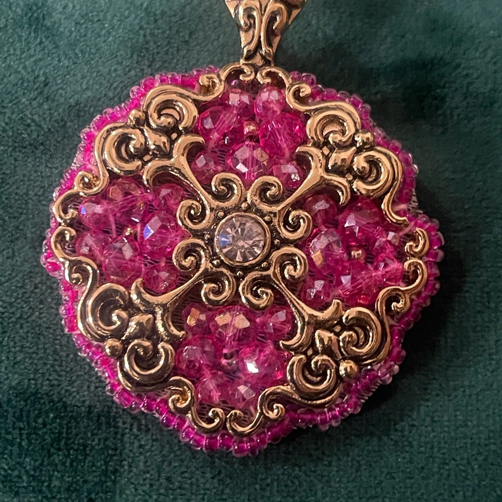 Pink and gold pendant
